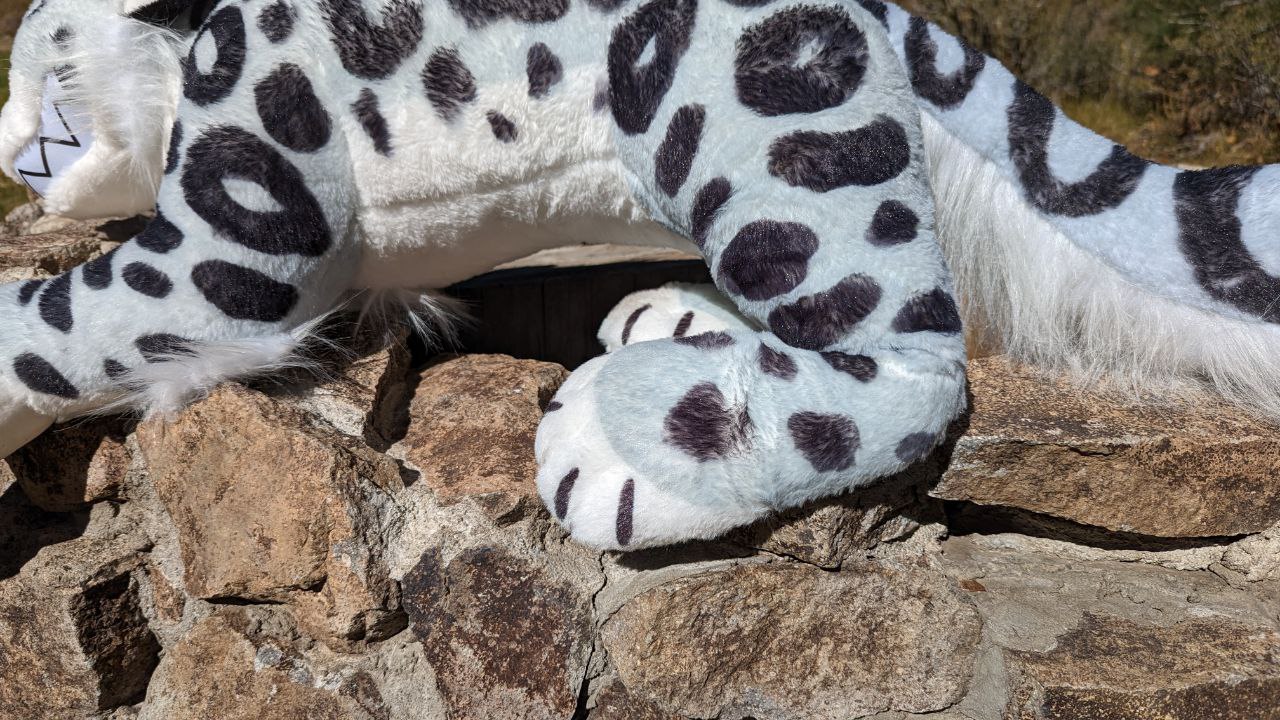 Snow leopard clearance plush toy